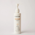 Corthe cleansing milk bottle on a white background